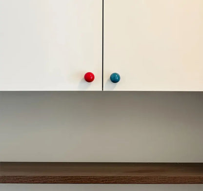 Farverige runde møbelknopper